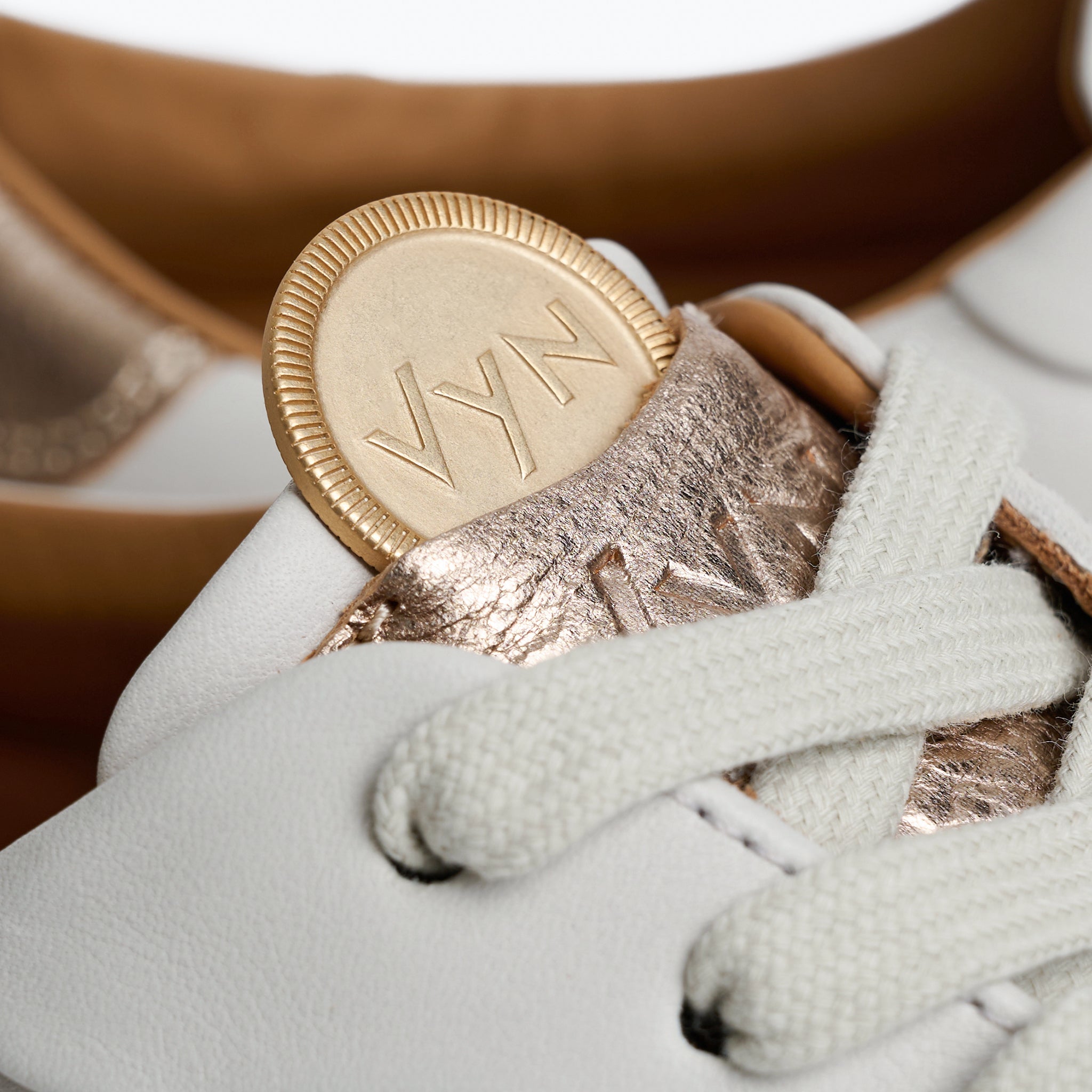 Women's Long-Luxe Off-White and Champagne Metallic Sneaker